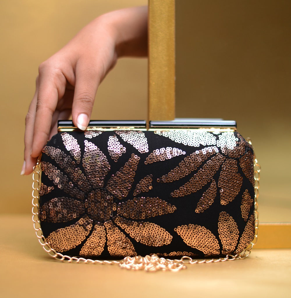 Black and 2025 rose gold clutch