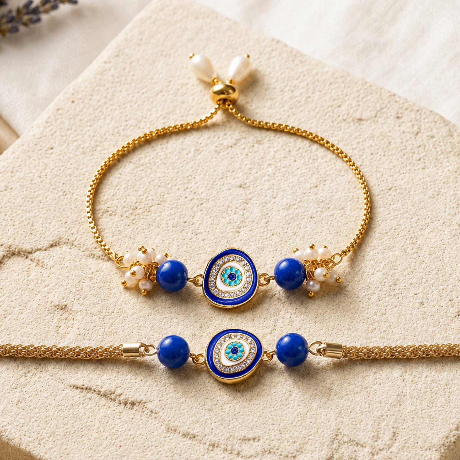 Artklim Blue Evil Eye Bhaiya Bhabhi Rakhi Set with Pearl Tassels
