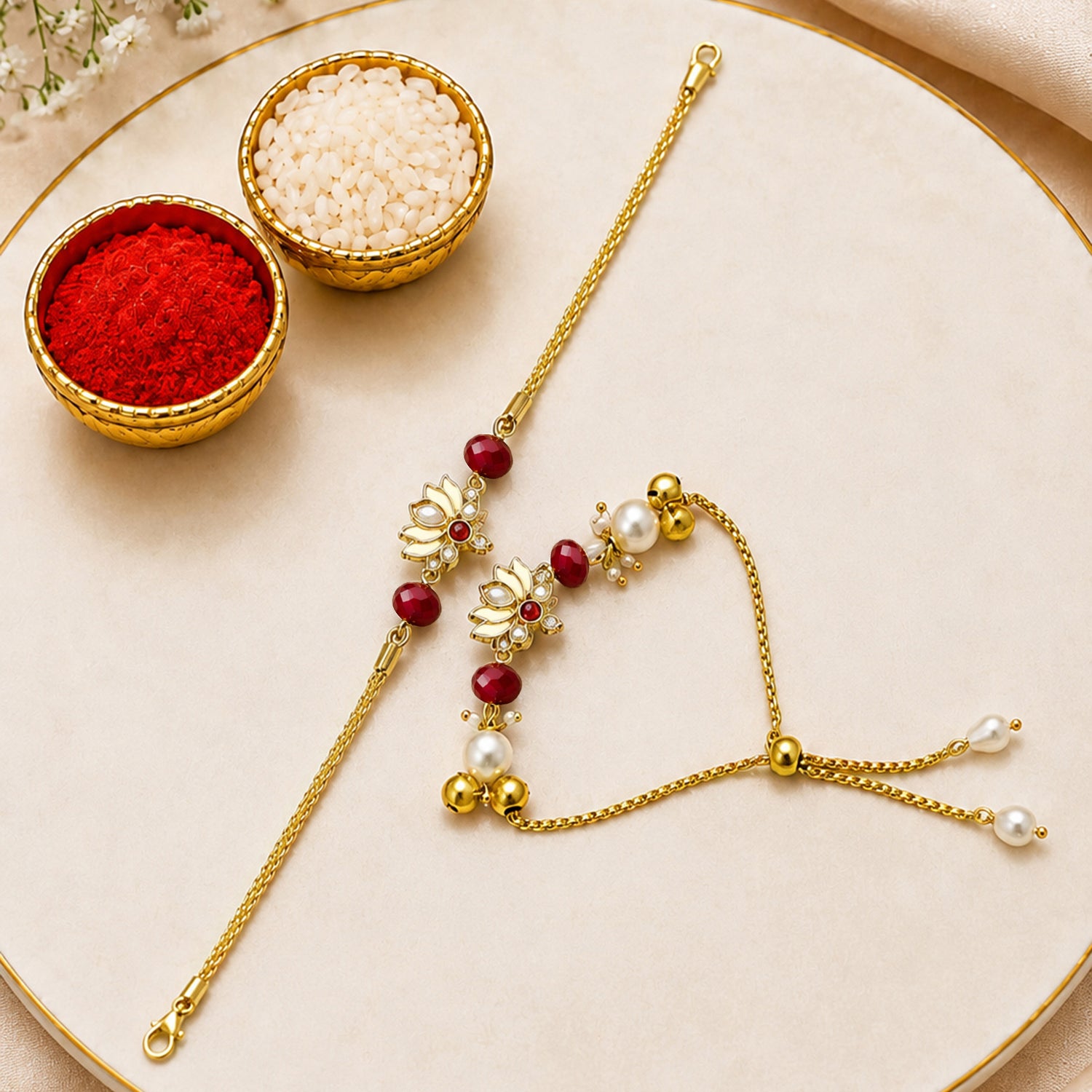 Artklim Gold-Plated Lotus Bhaiya Bhabhi Rakhi Set with Red Beads