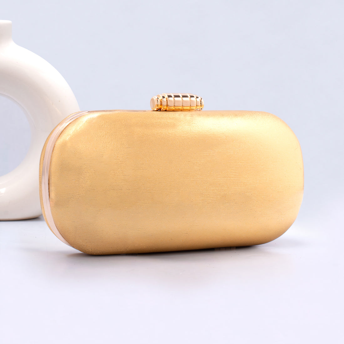 Artklim Golden Shiny Fabric Capsule Shaped Clutch