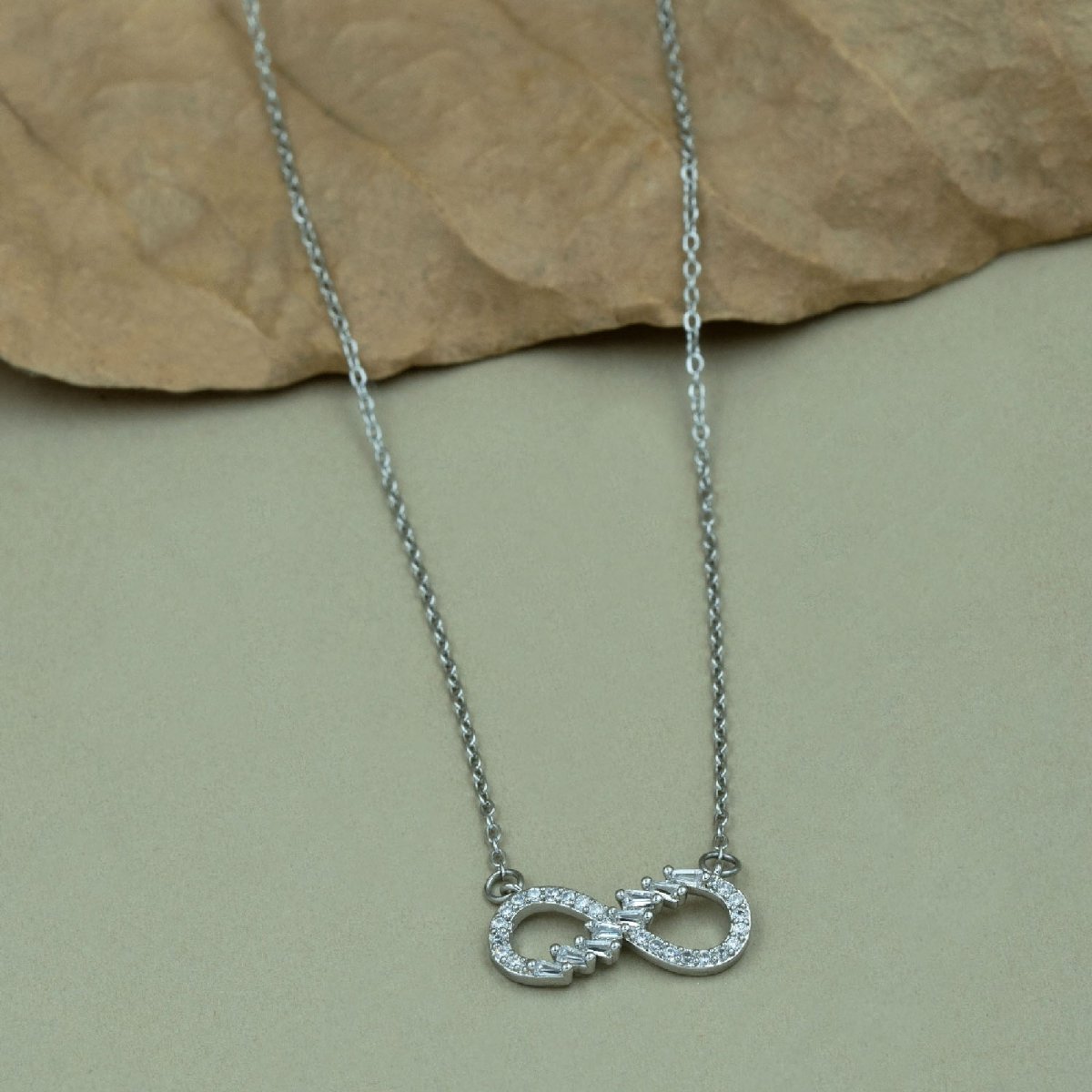 Artklim Infinity Stone Studded Silver Pendant Necklace