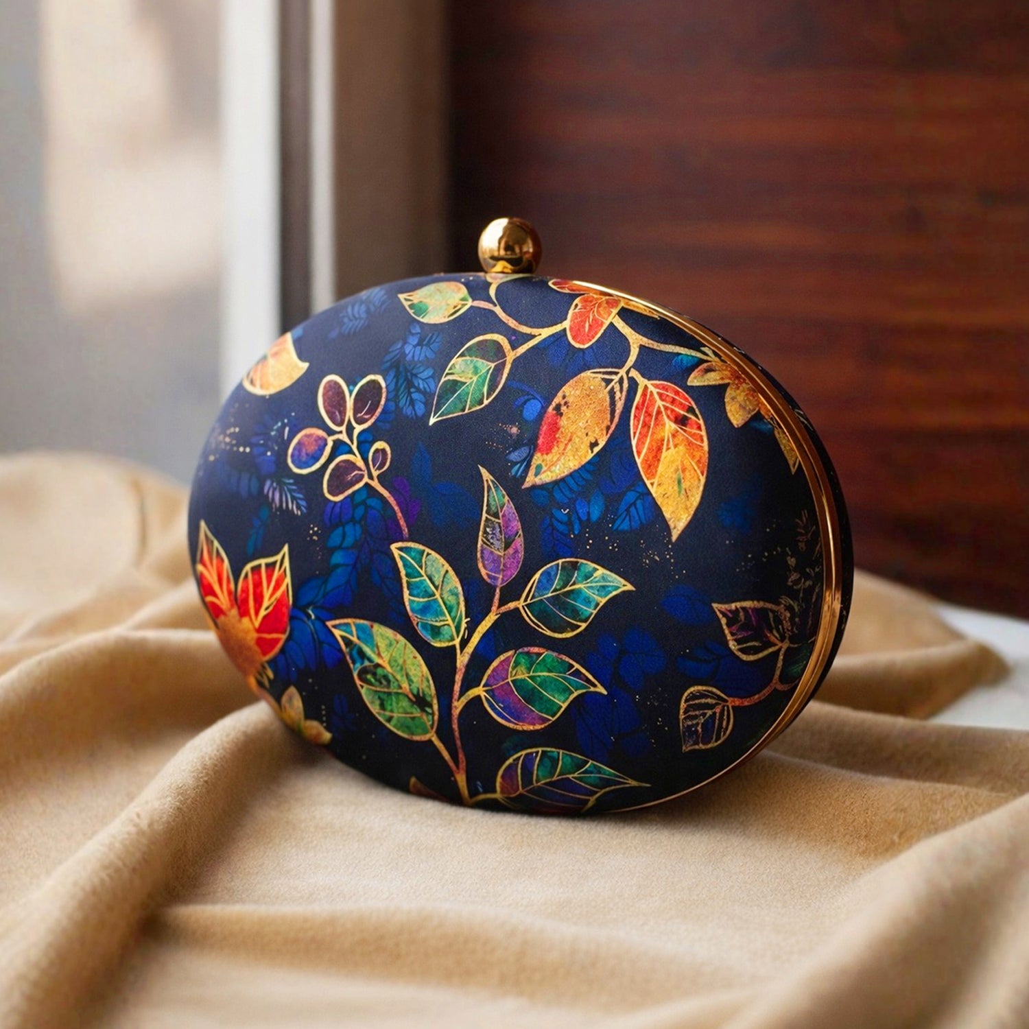 Blue Batik Leaves Print Oval Clutch