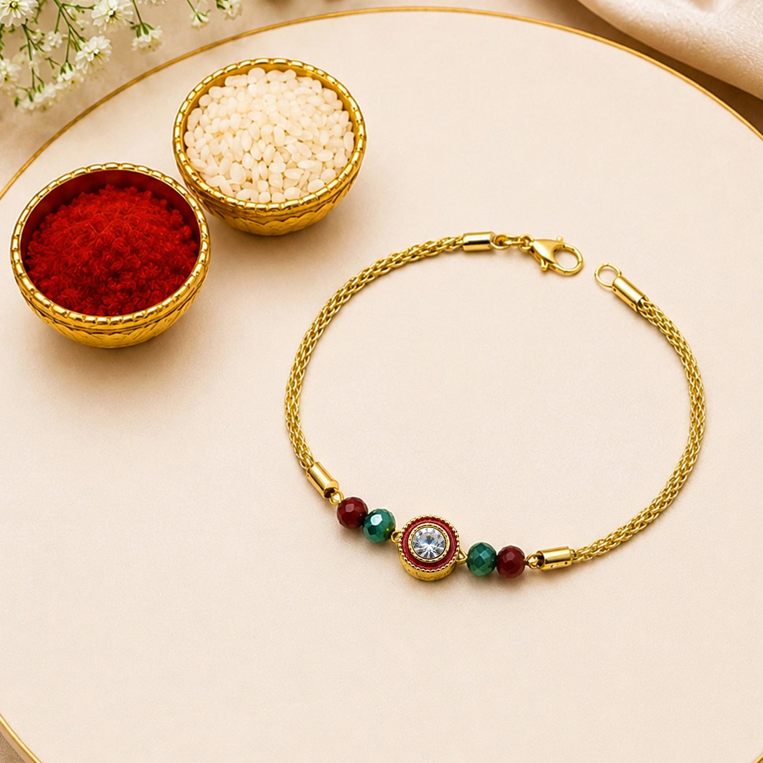 Artklim Luxury Crystal Rakhi with Red & Green Beads for Raksha Bandhan