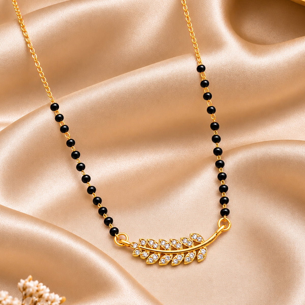 Artklim Elegant Gold-Plated Leaf Design Crystal Mangalsutra with Black Beads