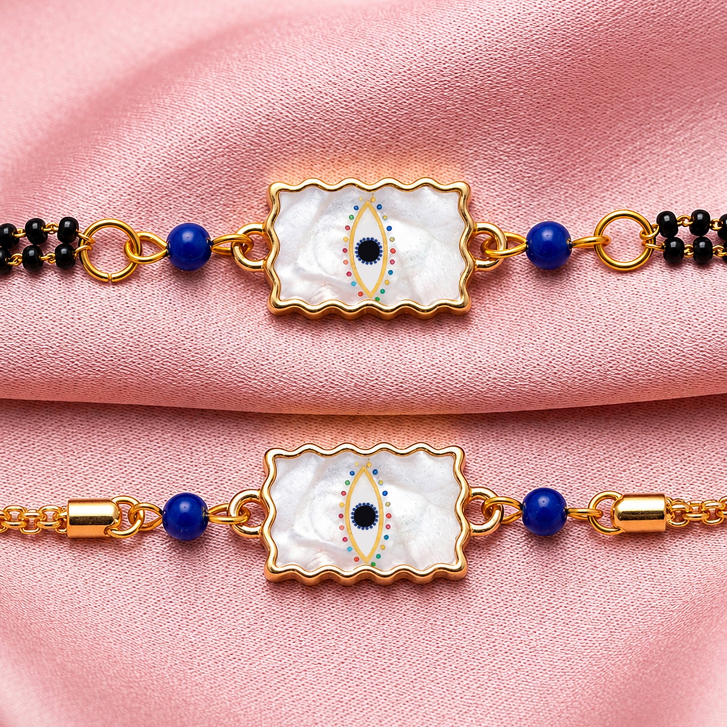 Artklim Elegant Minimal Evil Eye Bhaiya Bhabhi Rakhi Set with Pearl Tassels