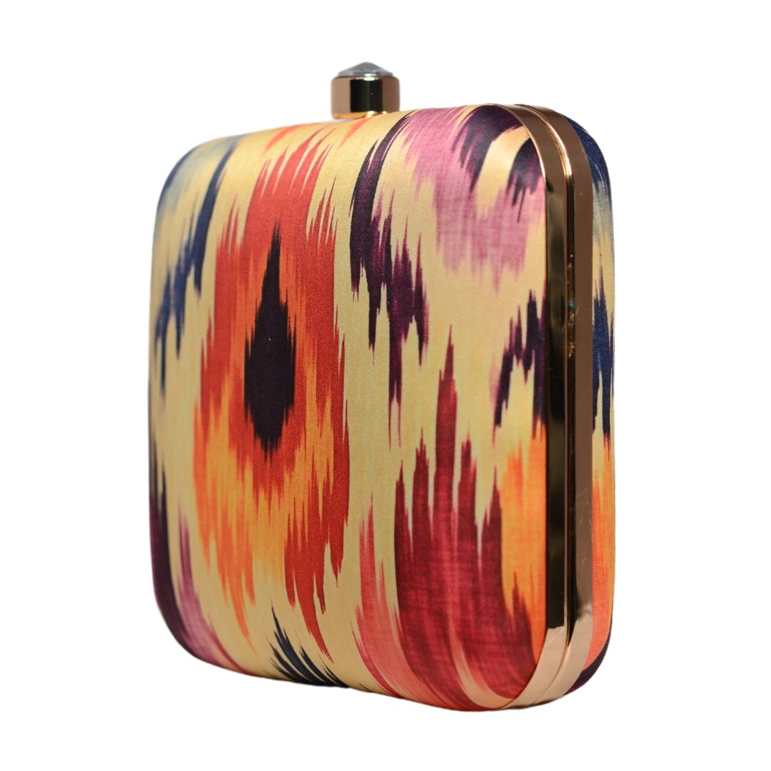 Yellow Based Red Ikkat Printed Clutch