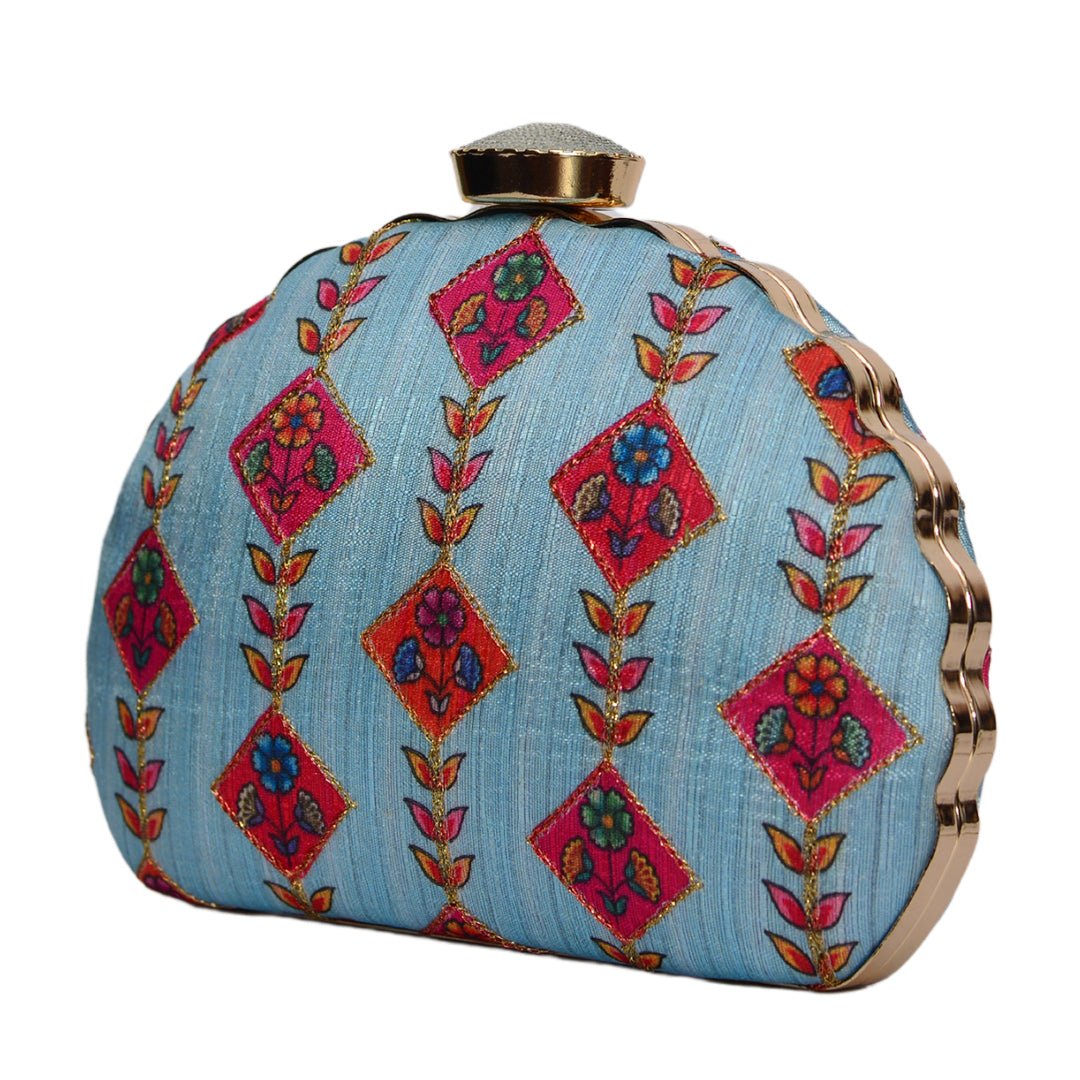 Traditional Motifs on Dreamy Blue Background Clutch