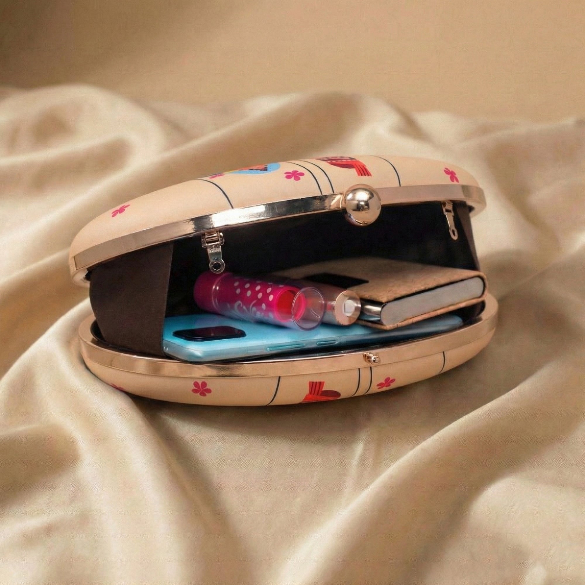 Indian Puppet Printed Oval Clutch