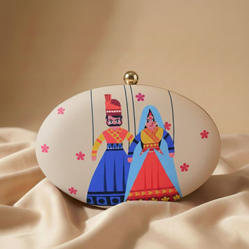 Indian Puppet Printed Oval Clutch