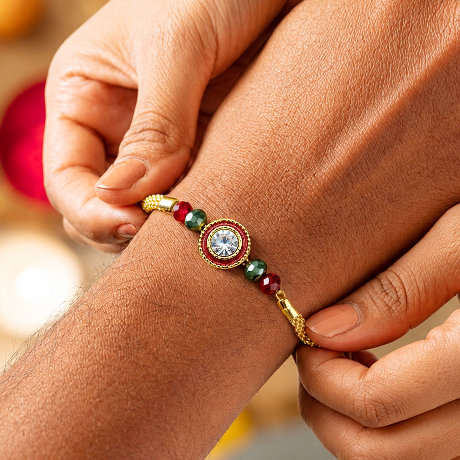 Artklim Luxury Crystal Rakhi with Red & Green Beads for Raksha Bandhan
