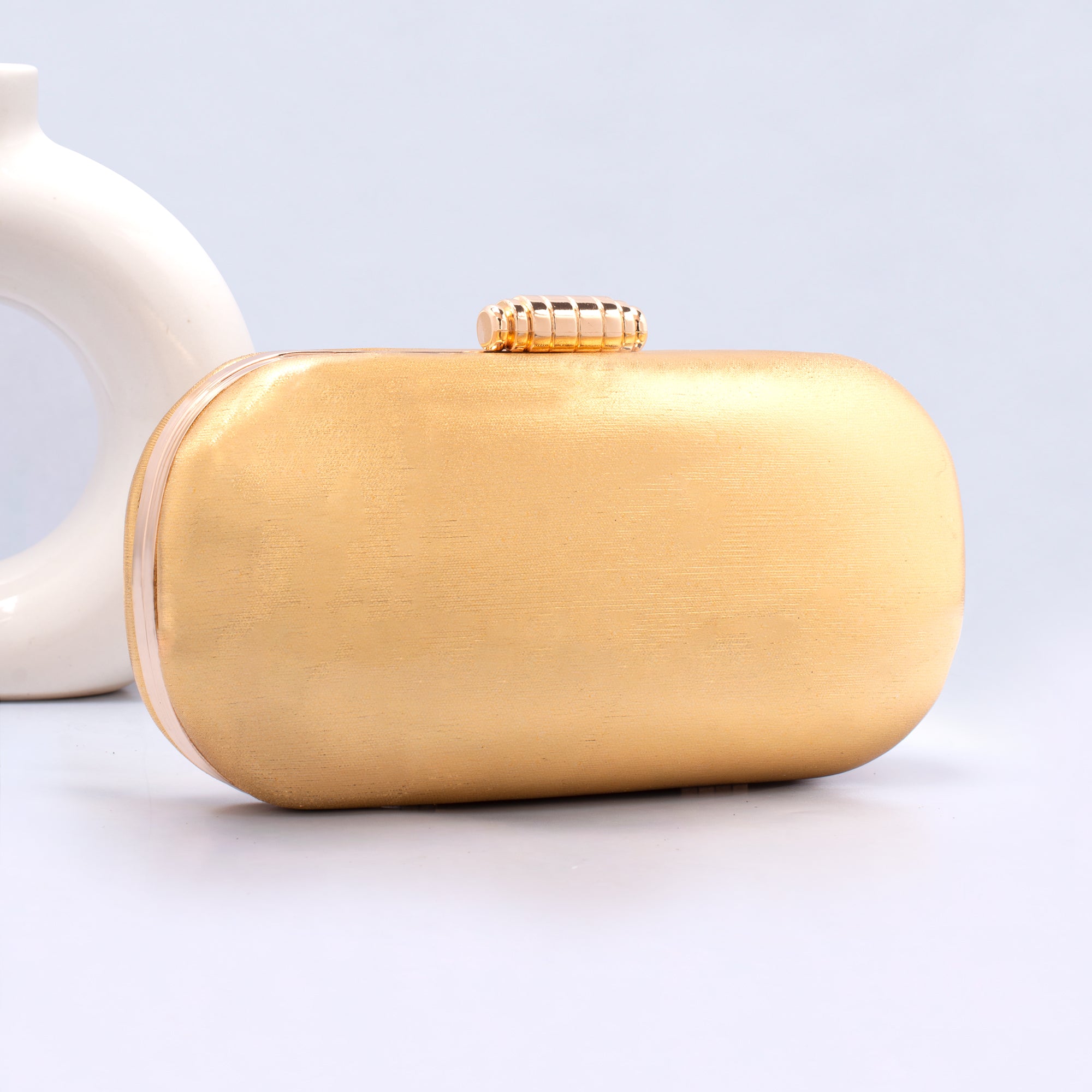 Artklim Golden Shiny Fabric Capsule Shaped Clutch