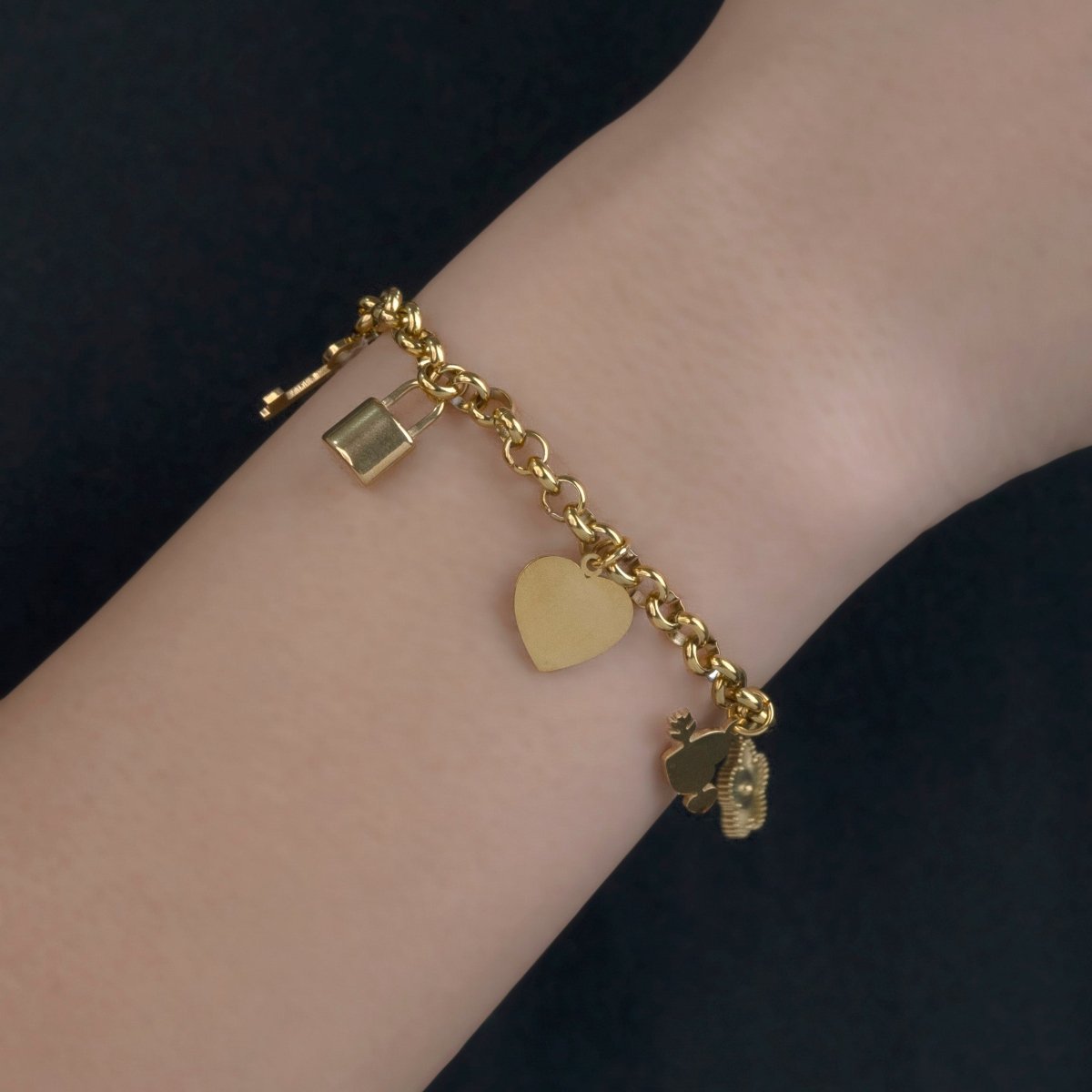 Artklim Gold Plated Clover Leaf, Heart, Lock And Key Charms Bracelet