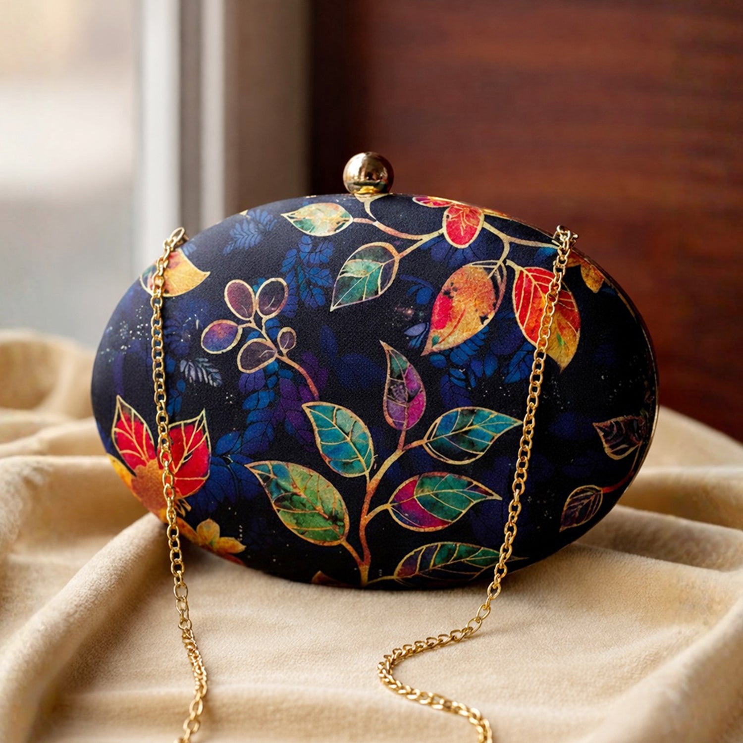 Blue Batik Leaves Print Oval Clutch