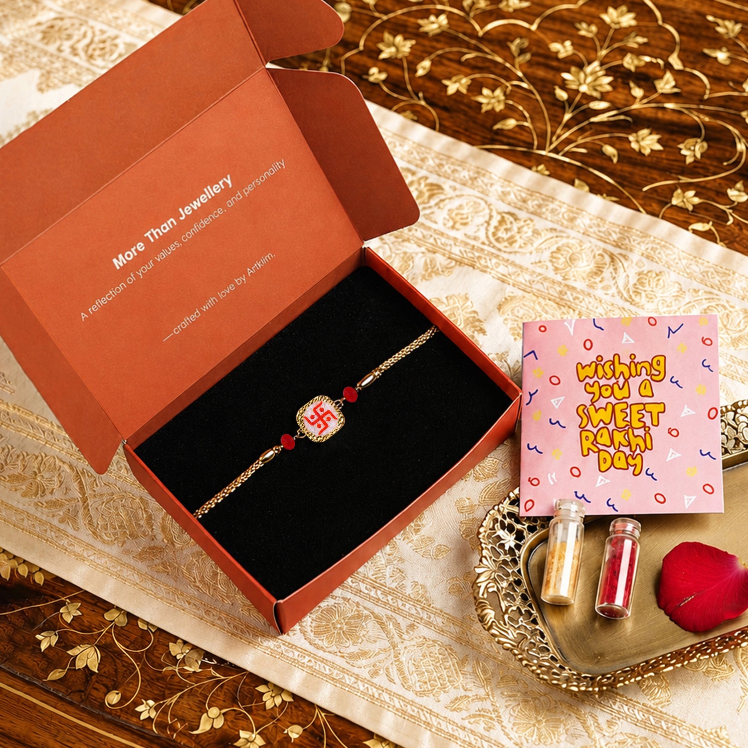 Artklim Traditional Swastik Charm Rakhi with Red Beads