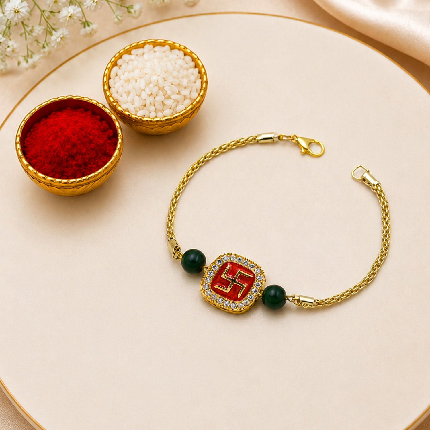 Artklim Gold-Tone Swastik Designer Rakhi with Green Beads
