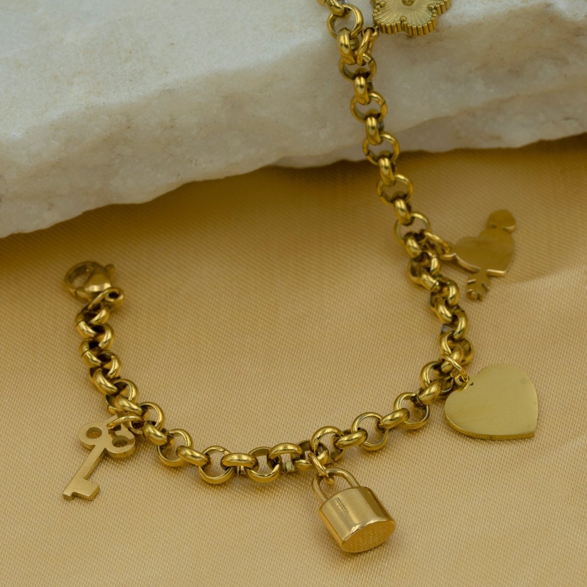Artklim Gold Plated Clover Leaf, Heart, Lock And Key Charms Bracelet