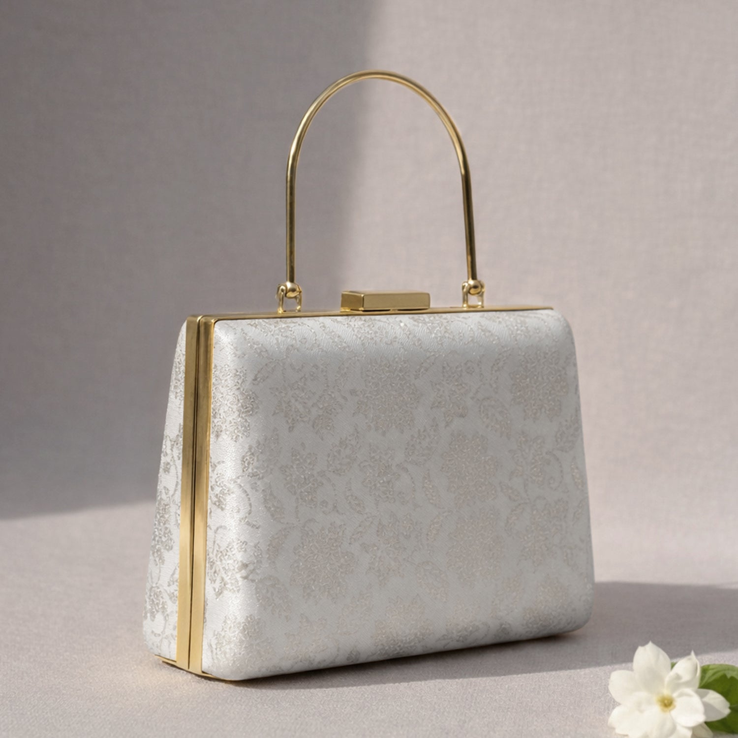 White And Silver Brocade Fabric Clutch