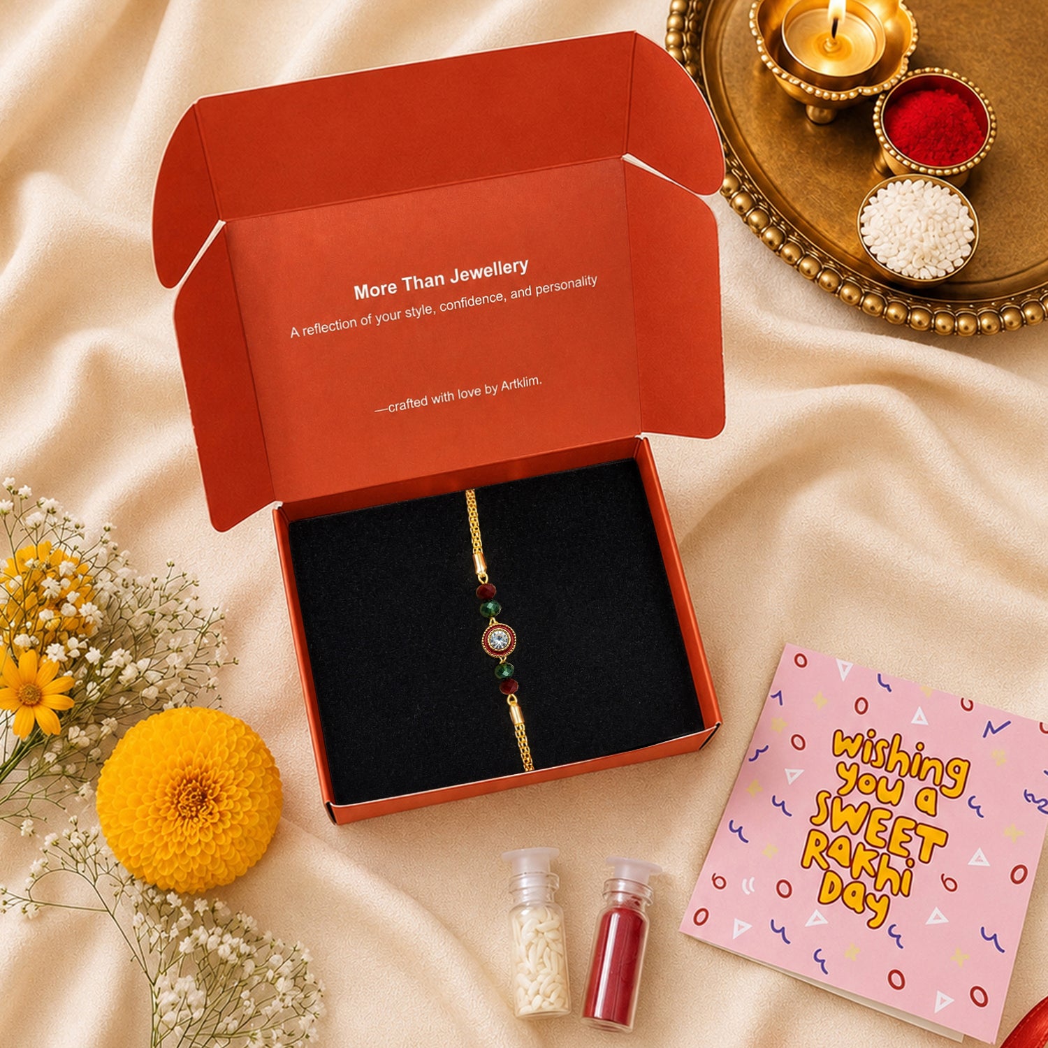 Artklim Luxury Crystal Rakhi with Red & Green Beads for Raksha Bandhan