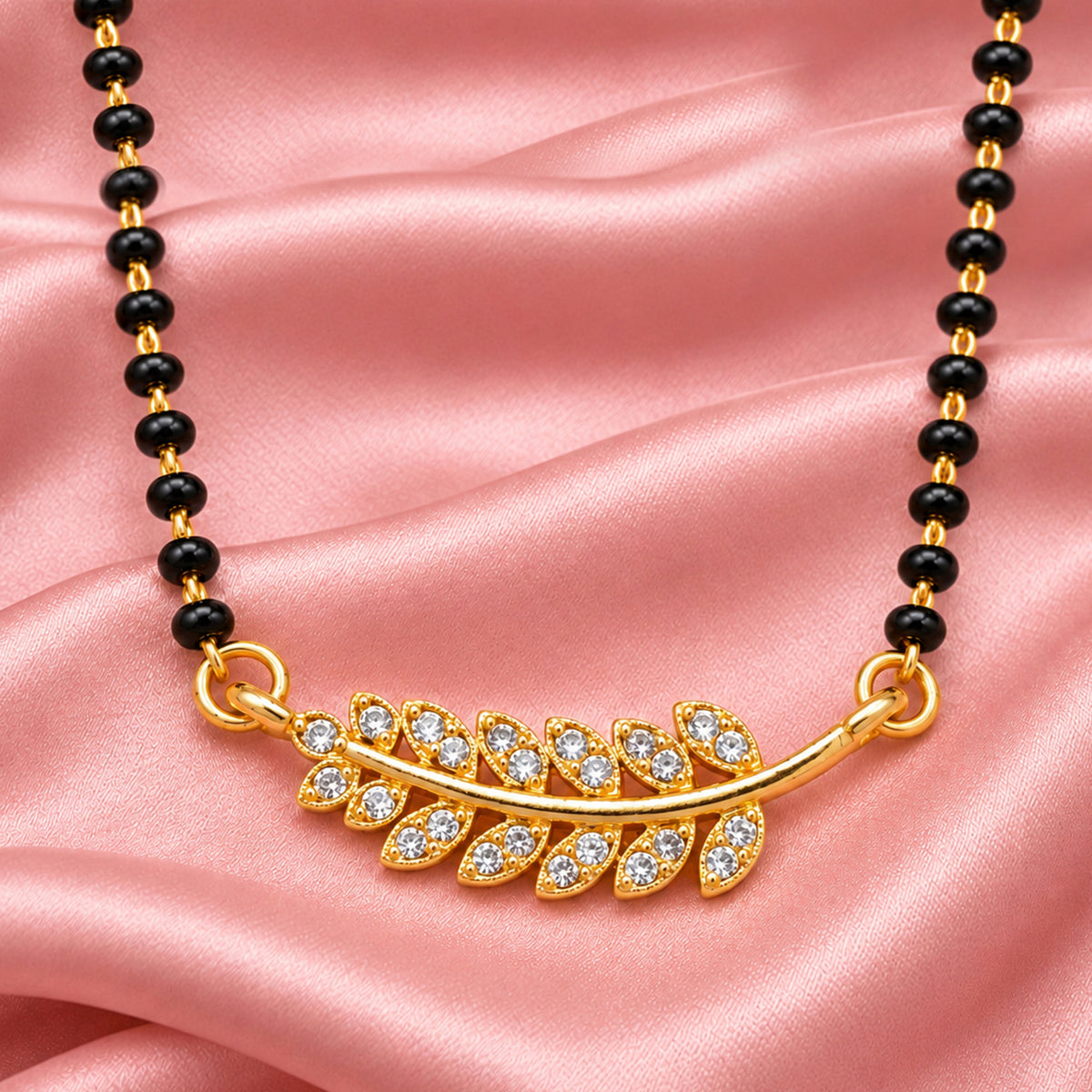 Artklim Elegant Gold-Plated Leaf Design Crystal Mangalsutra with Black Beads