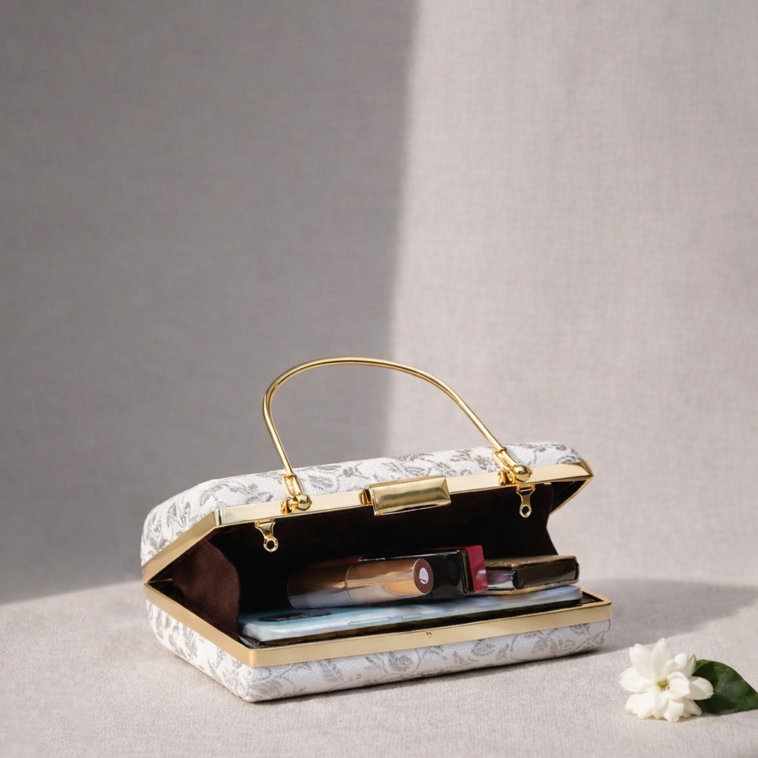 White And Silver Brocade Fabric Clutch