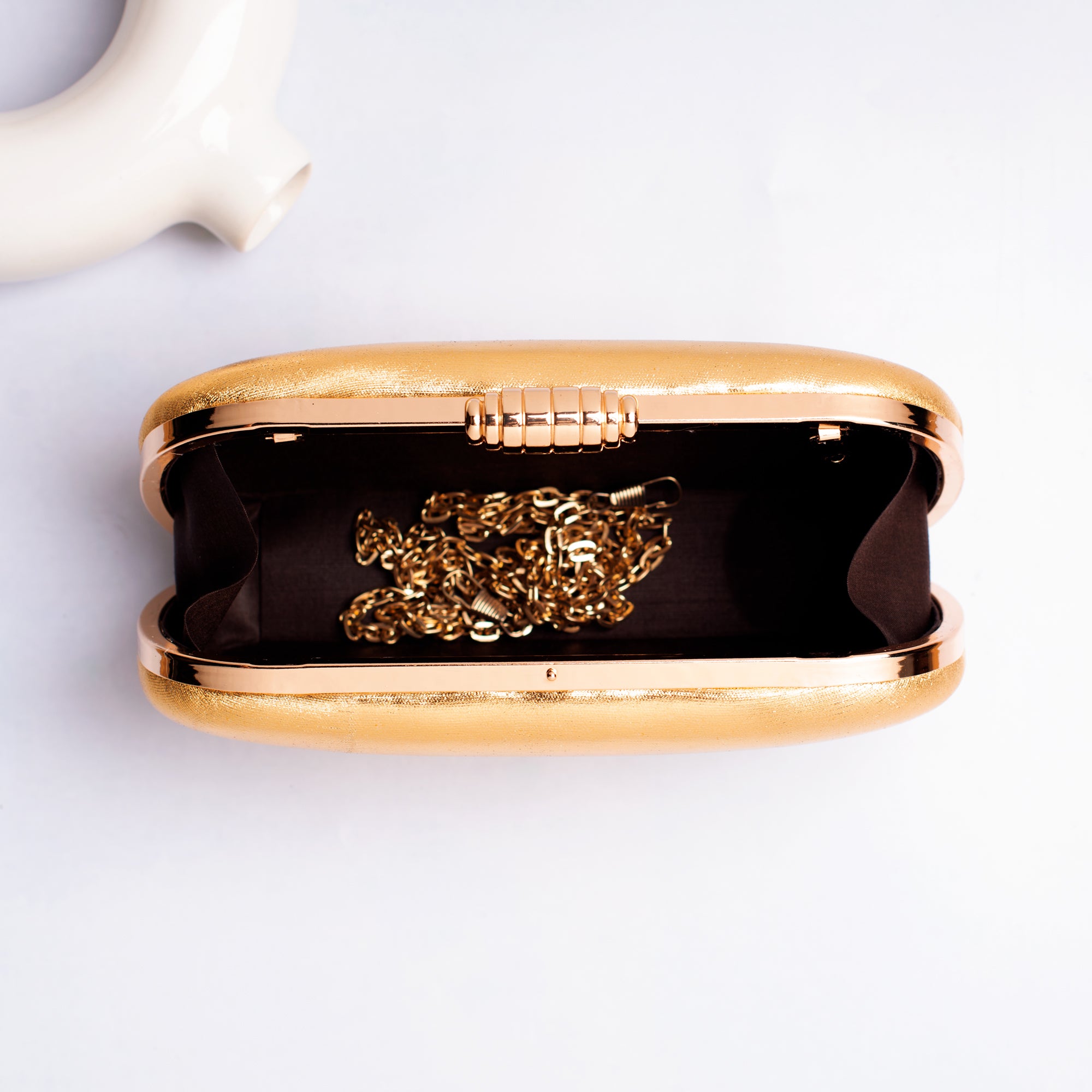 Artklim Golden Shiny Fabric Capsule Shaped Clutch