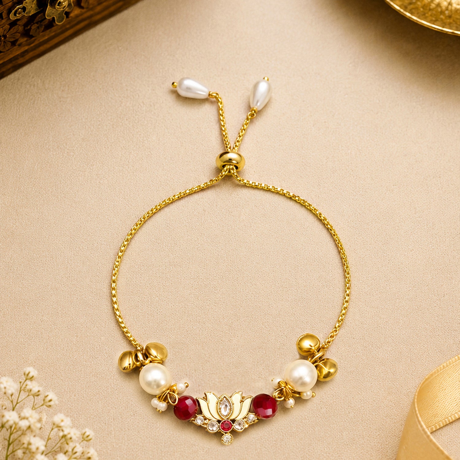 Artklim Gold-Plated Lotus Bhaiya Bhabhi Rakhi Set with Red Beads