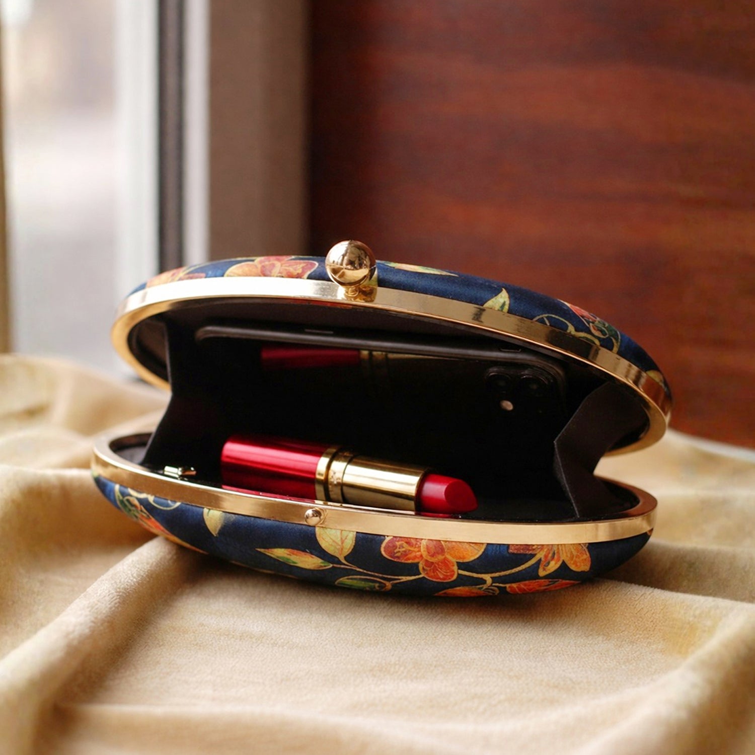 Blue Batik Leaves Print Oval Clutch