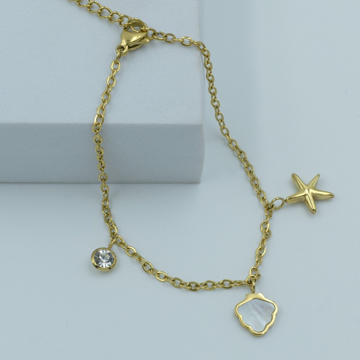 Artklim Gold Plated Starfish Shell And Star Charms Bracelet