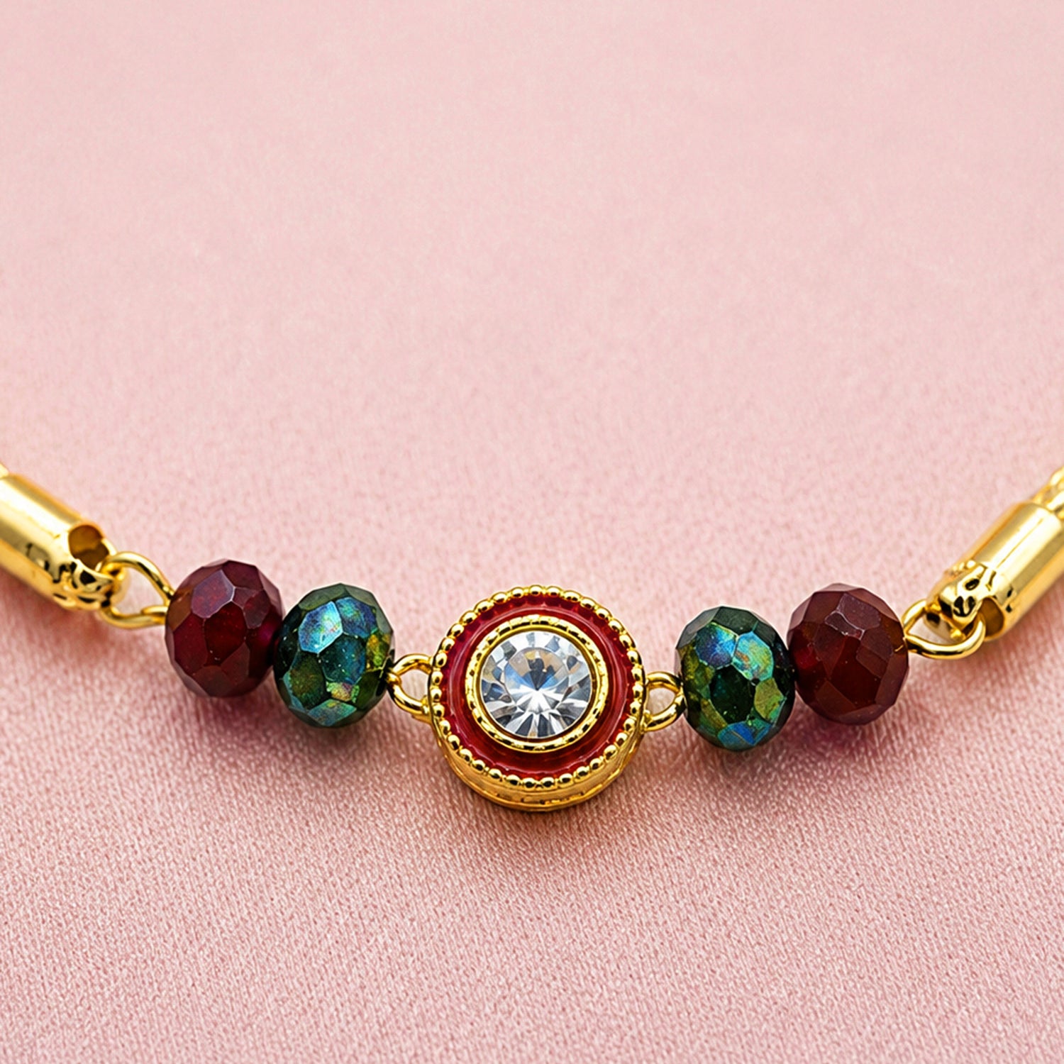 Artklim Luxury Crystal Rakhi with Red & Green Beads for Raksha Bandhan