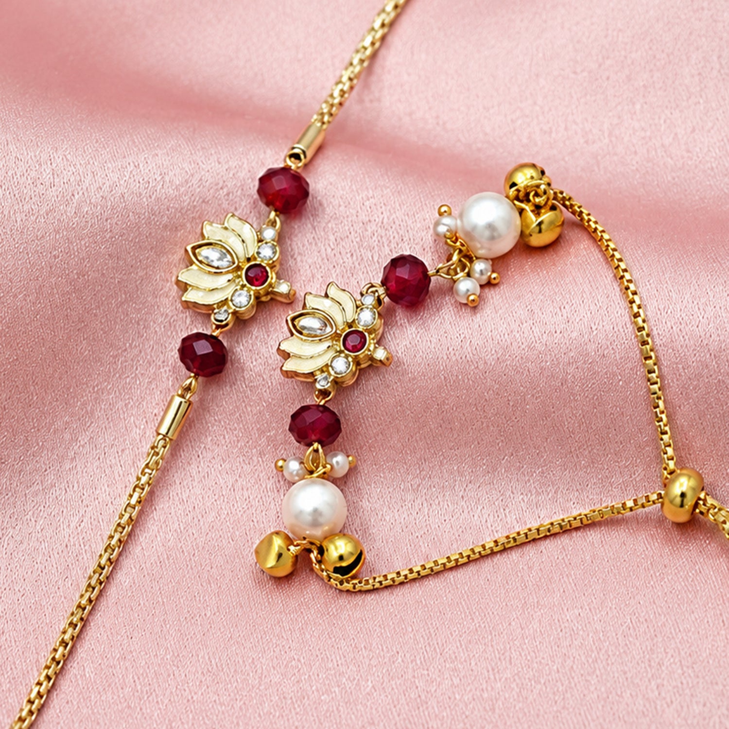 Artklim Gold-Plated Lotus Bhaiya Bhabhi Rakhi Set with Red Beads