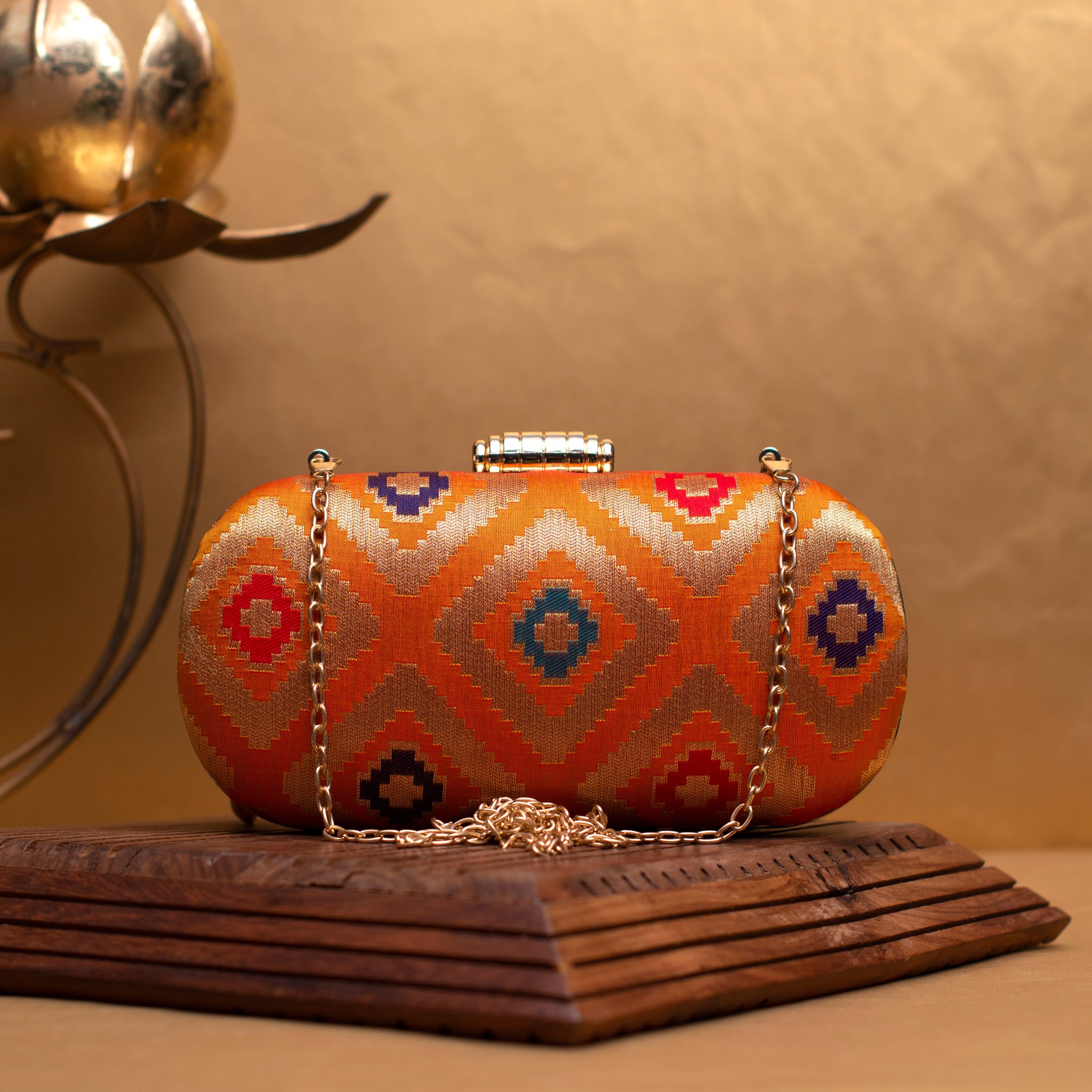 Orange And Golden Brocade Fabric Clutch