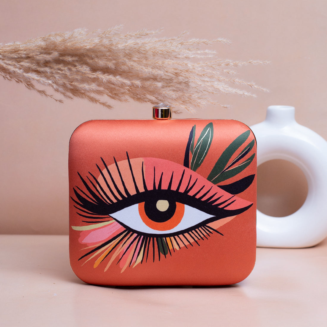 Artklim Orange Based Eye Printed Clutch