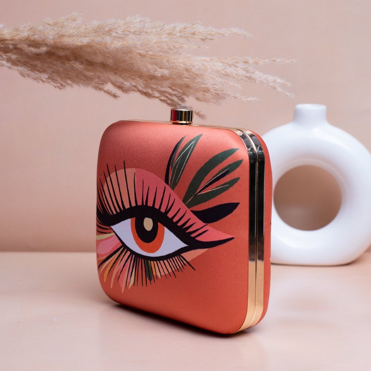 Artklim Orange Based Eye Printed Clutch