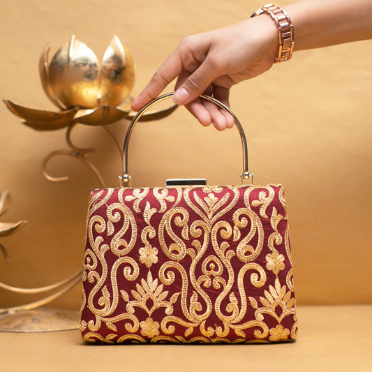 Maroon And Golden Multipattern Embroidery Clutch