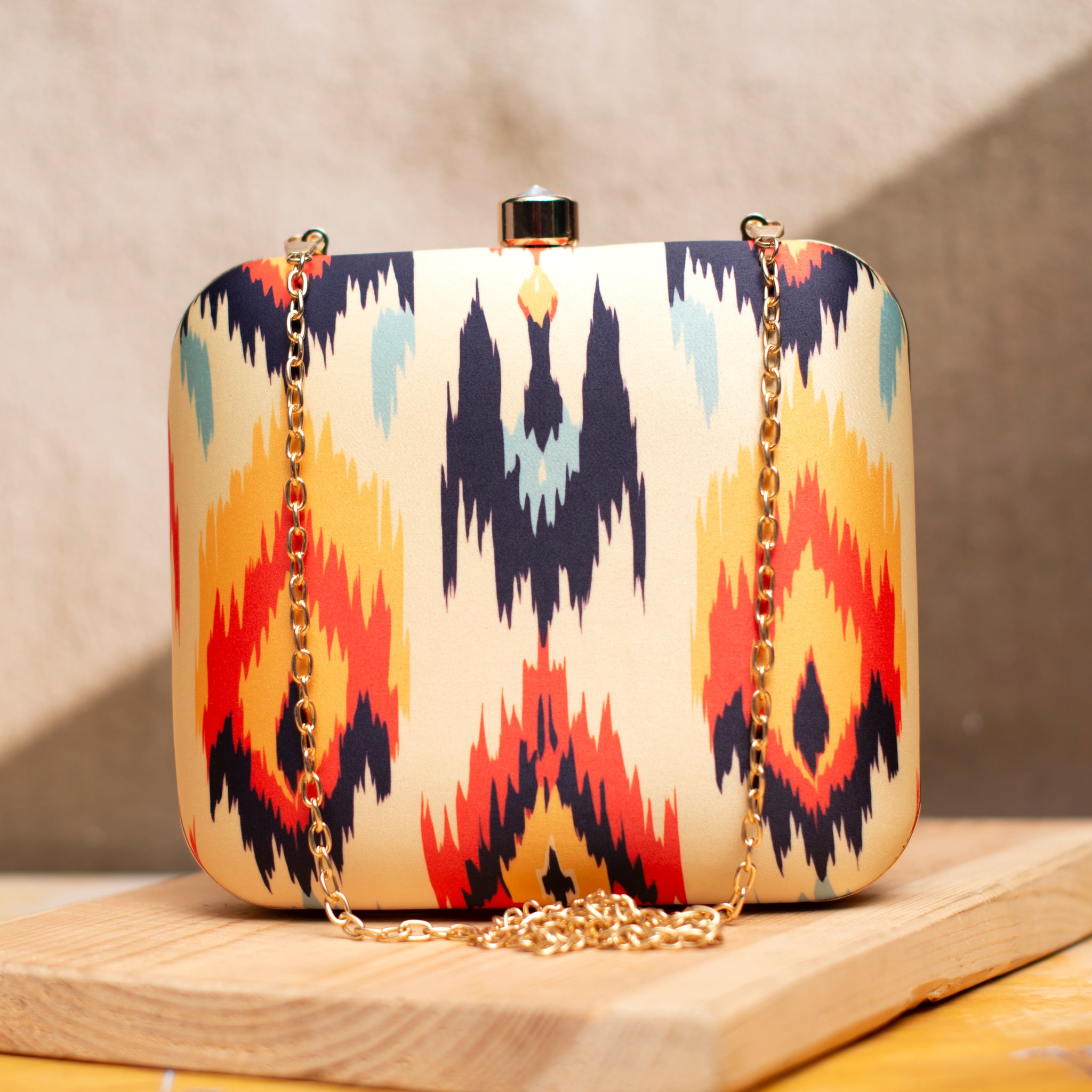 Yellow Based Multicoloured Ikkat Printed Clutch