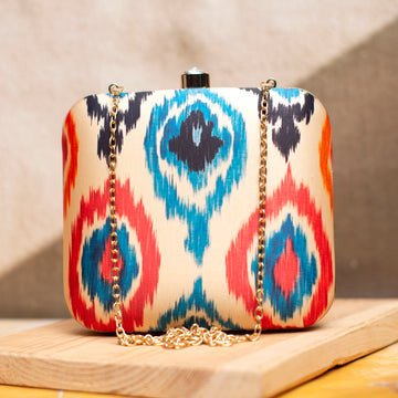 Red And Blue Ikkat Printed Clutch