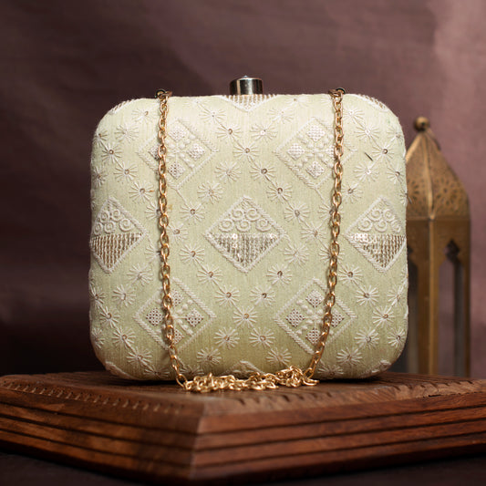 Off White Threadwork And Sequins Embroidery Clutch