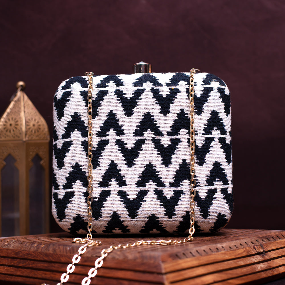 White and Black fabirc Clutch