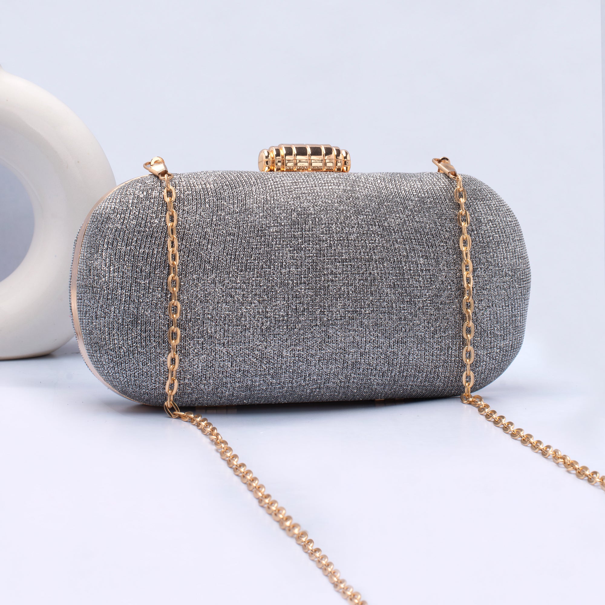 Artklim Silver Shiny Fabric Capsule Shaped Clutch