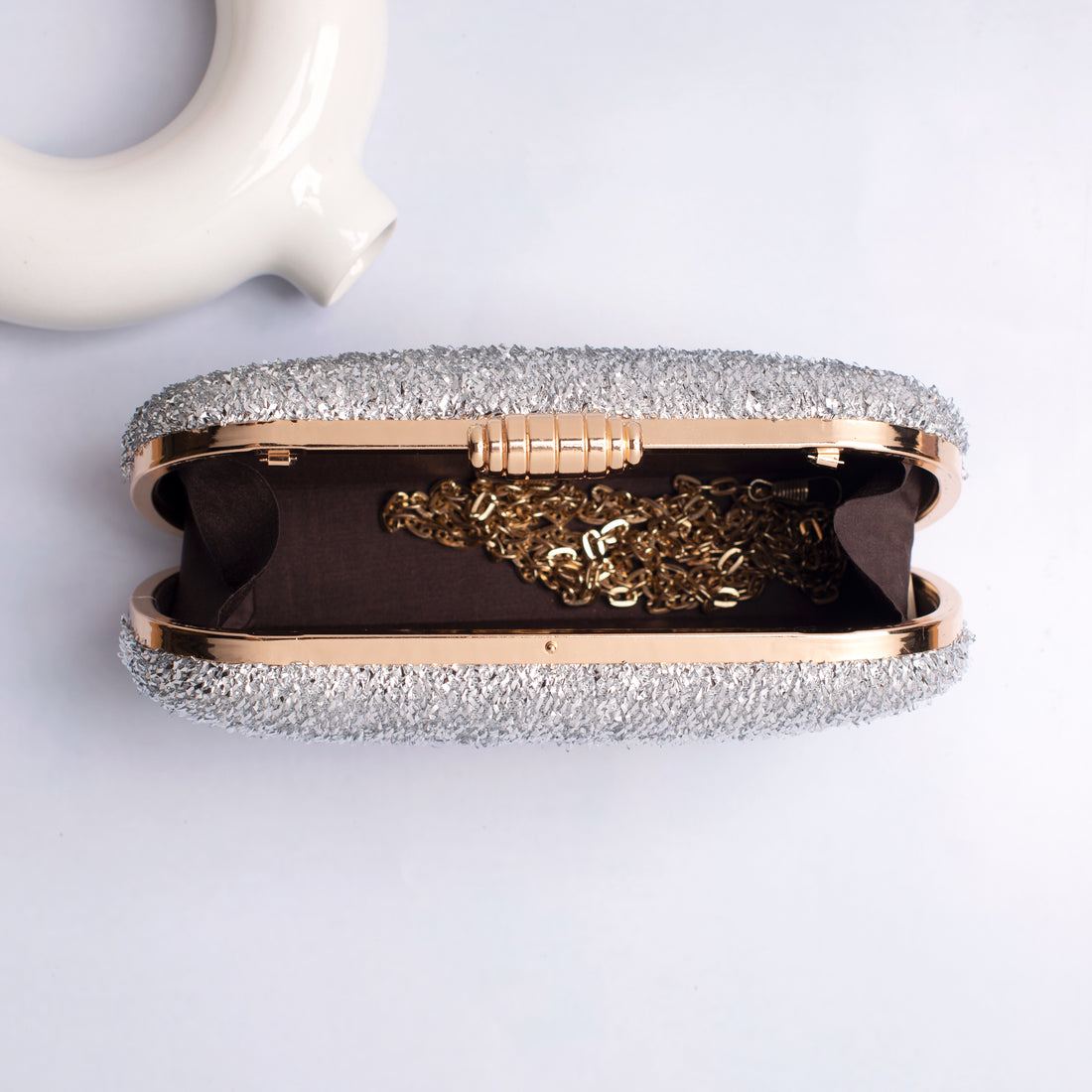 Artklim Silver Shimmery Fabric Capsule Shaped Clutch