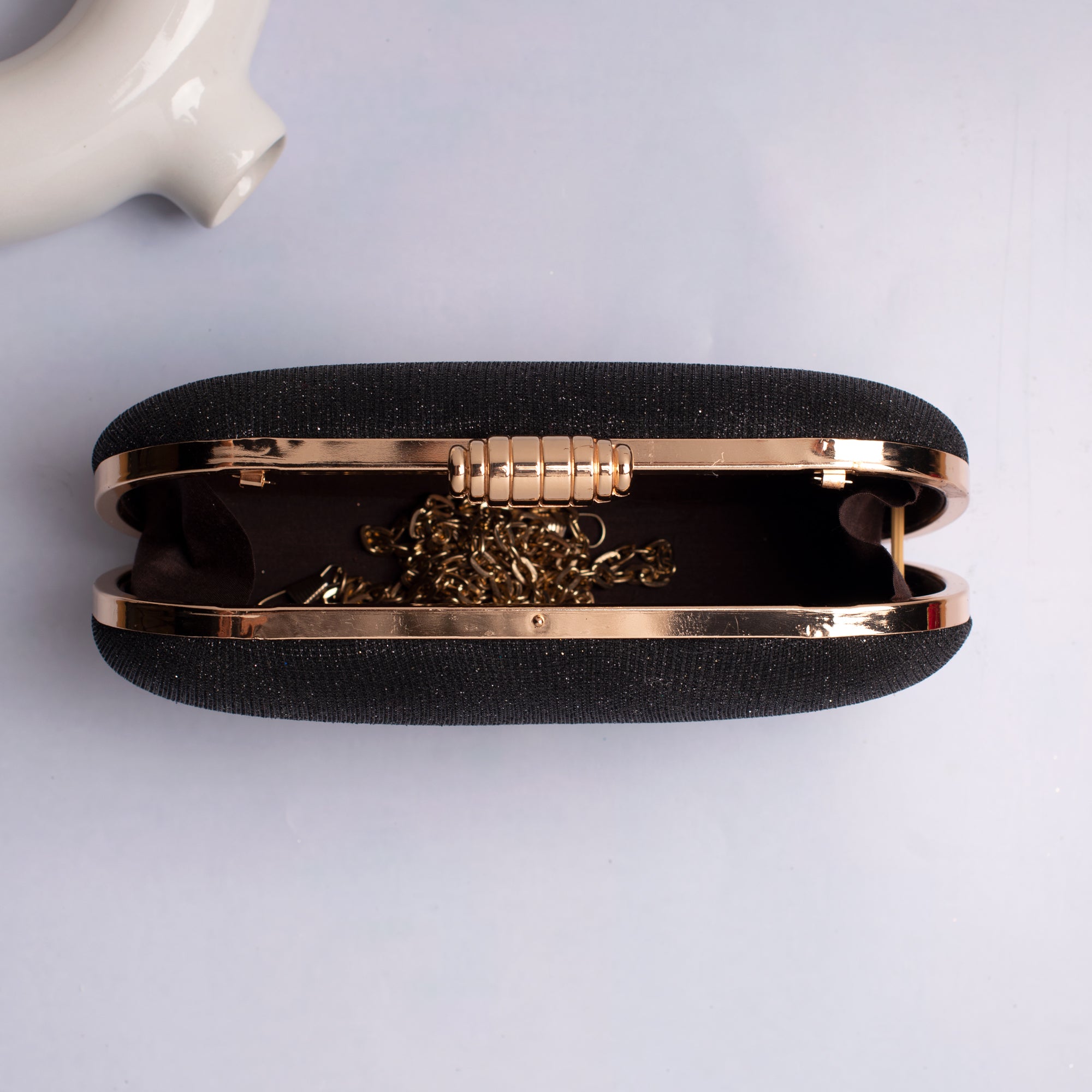 Artklim Black Based Shiny Fabric Capsule Shaped Clutch