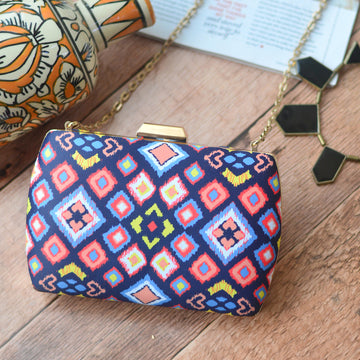 Blue Clutch With Multicolor Design