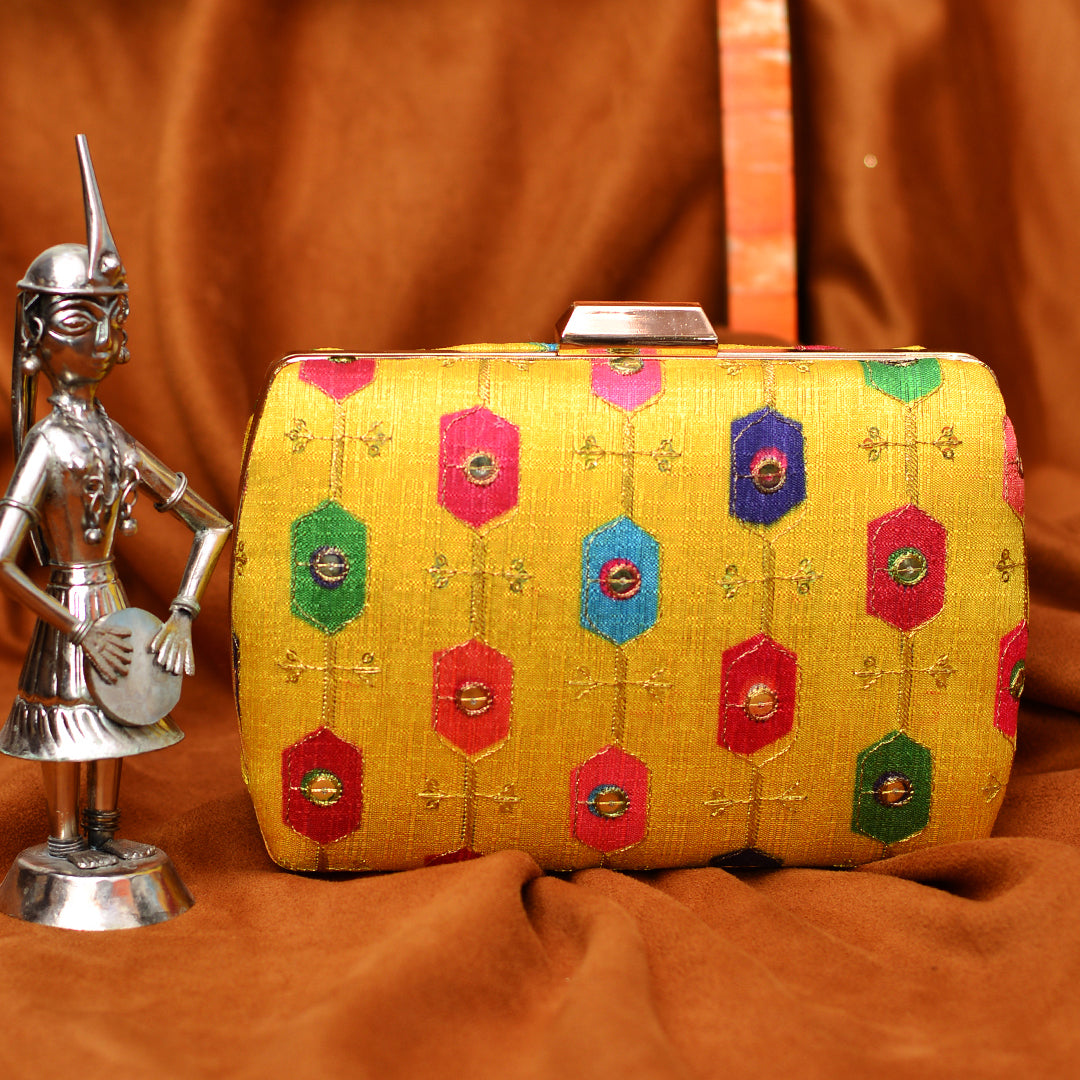 Yellow Color Clutch With Multicolor Motif