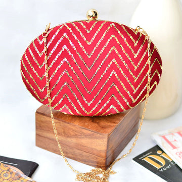 Red Embroidered Oval Clutch