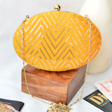 Yellow Embroidered Oval Clutch